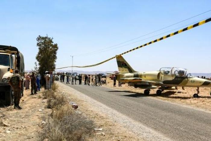Libyan warplane landed on a road in neighbouring Tunisia