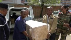 The coffin containing the remains of British Cambridge University student Alana Cutland was carried out from the morgue