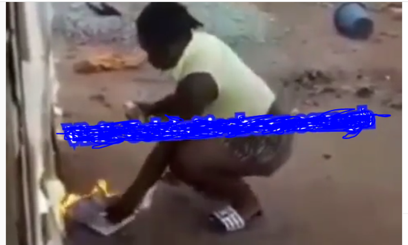 End time Ghanaian slay queen pours kerosene on 'Bible' sets it ablaze to test Gods power (video)