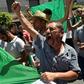 Algerians -- seen here carrying the national flag -- protested against the authorities for a nineteenth consecutive week on Friday