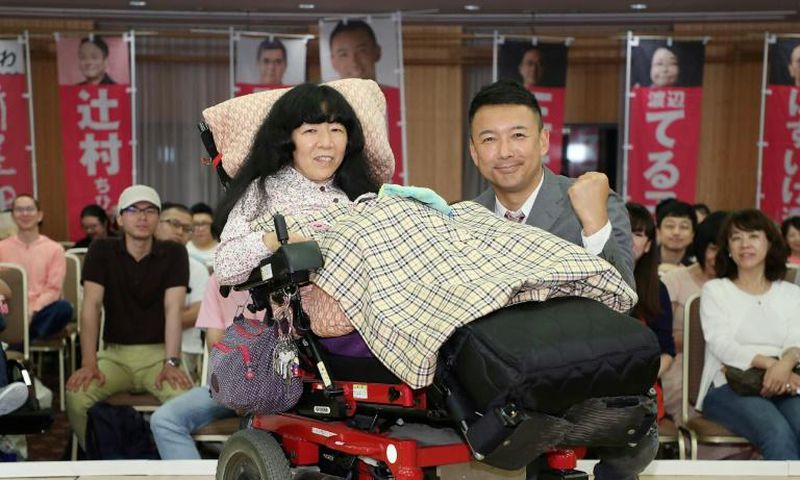 Newly elected lawmaker Eiko Kimura, who is paralysed from the neck down, has called for a system to ensure necessary care for the disabled