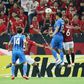 Ulsan's Joo Min-kyu (number 11) rises to head the equaliser against Urawa Reds in Saitama