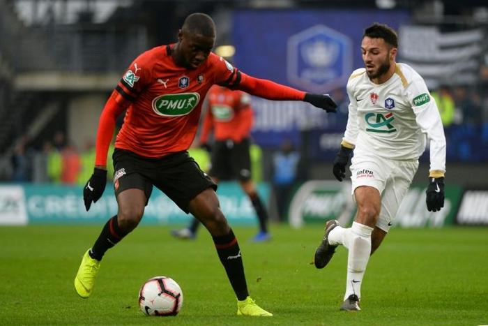 Haris Belkebla (R) in action for Brest against this season's French Cup winners Rennes