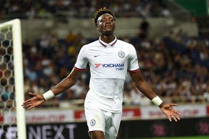 Chelsea forward Tammy Abraham celebrates after scoring against Barcelona