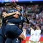 Wendie Renard is jumped on by her teammates after scoring one of her two goals in France's 3-0 win over South Korea on Friday as the Women's World Cup kicked off in Paris