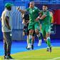 Midfielder Sofiane Feghouli (2nd-L) celebrates scoring for Algeria as Ivory Coast coach Ibrahim Kamara (L) looks on during an Africa Cup of Nations quarter-final in Egypt