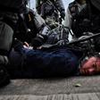 Several of the black-clad protesters were detained in Hong Kong's Kwun Tong district as officers swept through