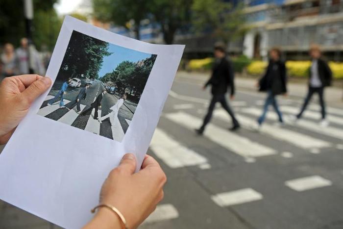Abbey Road has drawn Beatles pilgrims from across the world, with countless fans having walked over the zebra crossing, replicating the picture