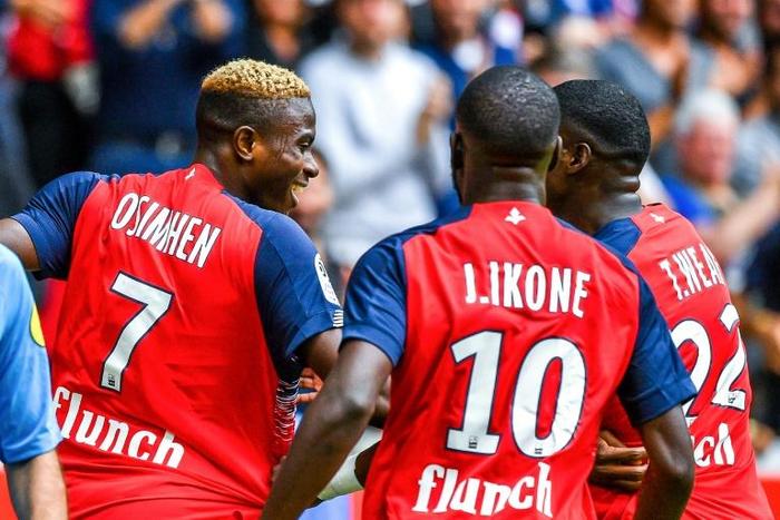 Osimhen (L) scored both Lille goals on his debut