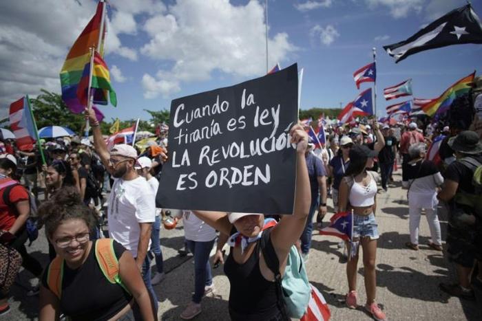 Puerto Ricans had waited expectantly for the announcement throughout the day, as rumors of the governor's forthcoming resignation swirled
