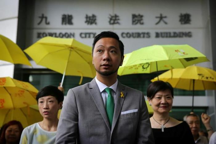 A group of police officers were filmed beating pro-democracy activist Ken Tsang after he had been dragged to a corner of a park