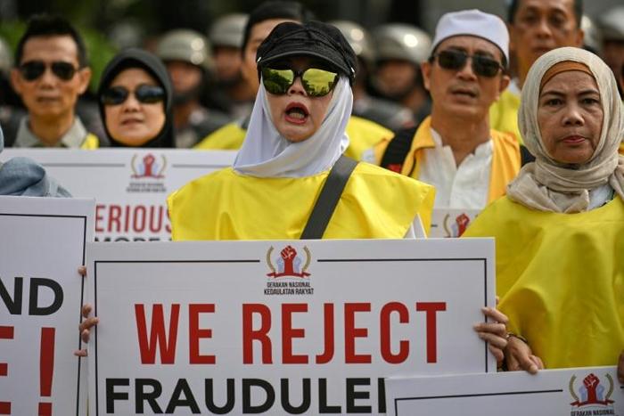 Police officers and soldiers have been deployed across Jakarta in anticipation of mass protests over claims of election rigging