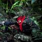 National Liberation Army guerrillas shoot during a training exercise in the jungle of Colombia's Choco department