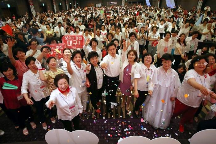 The performance at the conservative Liberty Korea Party's 'Woman Festa' saw five party supporters on stage pull down baggy long shorts and bend over to display the phrase 'Victory for LKP' written on boxer shorts