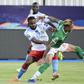 Madagascar midfielder Anicet Andrianantenaina (R) tussles for possession with Democratic Republic of Congo forward Cedric Bakambu during an Africa Cup of Nations last-16 match in Egypt