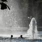 Children cool down in a fountain in Oslo