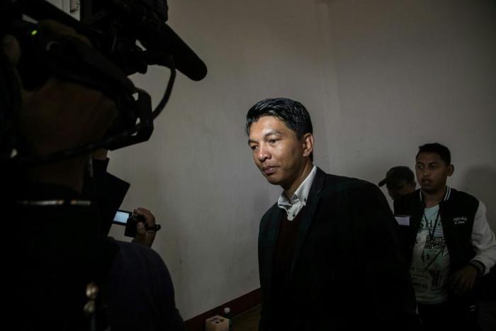 Madagascan President Andry Rajoelina's coalition, in a recent file image, has won an absolute majority in the new parliament, provisional data show, though the opposition is crying foul