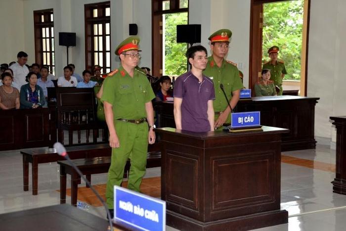 Environmental activist Nguyen Ngoc Anh in the dock during his trial in southern Vietnam's Ben Tre province