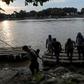 Central American migrants use a makeshift raft to illegally cross the Suchiate river from Tecun Uman, in Guatemala, to Ciudad Hidalgo, Mexico -- the US is trying to stem the flow of migrants towards the US border