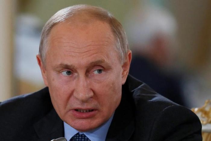 Russian President Vladimir Putin said Venezuelan opposition leader Juan Guaido was "likeable" but warned that the world would plunge into chaos if there were no rules