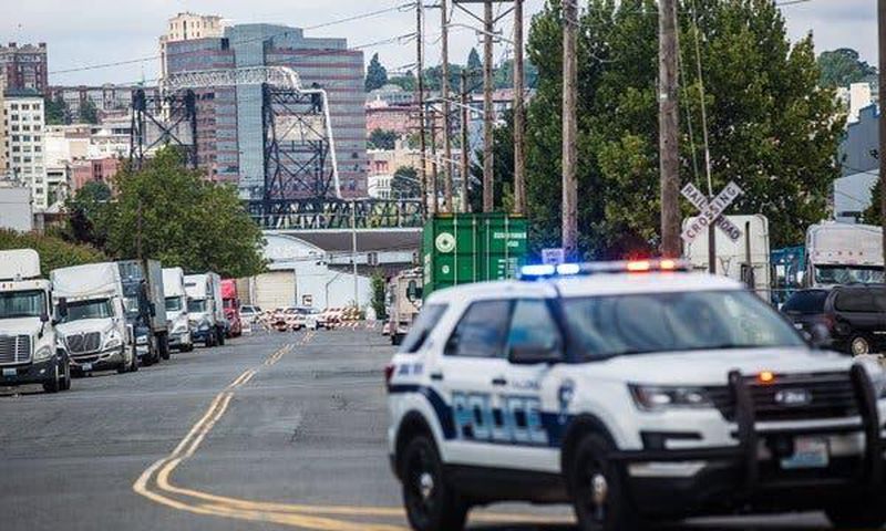 Man attacking ice detention center is fatally shot by the police