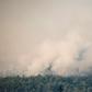 Over 200 firefighters were on the front line on Greece's second largest island, backed by 75 fire trucks, nine water-bombing helicopters and seven planes