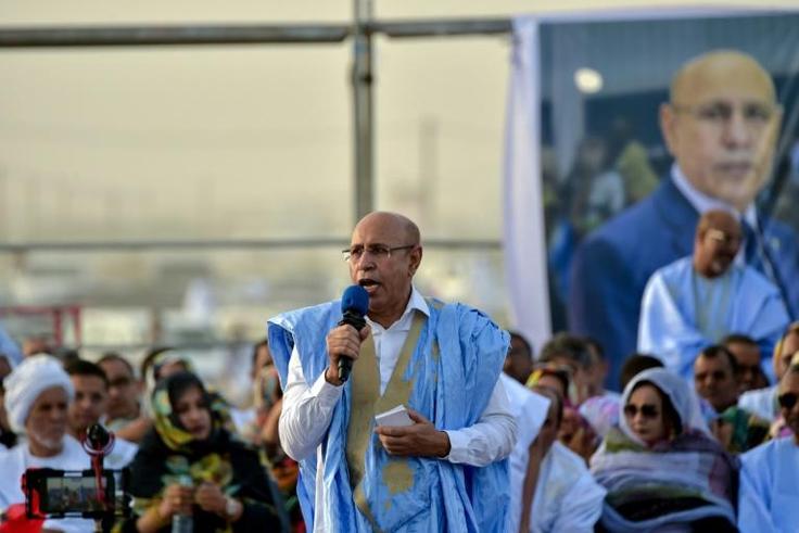 Mauritania's President Mohamed Ould Cheikh El Ghazouani, (C) seen here on the campaign trail, was sworn in after winning a June election