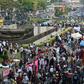 Supporters of ex-general Prabowo Subianto gathered to listen to the verdict broadcast on speakers near the constitutional court