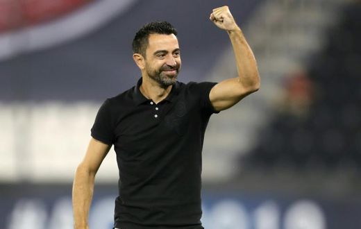 Al Sadd's Spanish coach Xavi Hernandez celebrated as his team scored on its way to victory over Al Duhail in the Asian Champions League