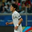 Japan's Koji Miyoshi celebrates after scoring during the 2-2 draw with Uruguay at the Copa America
