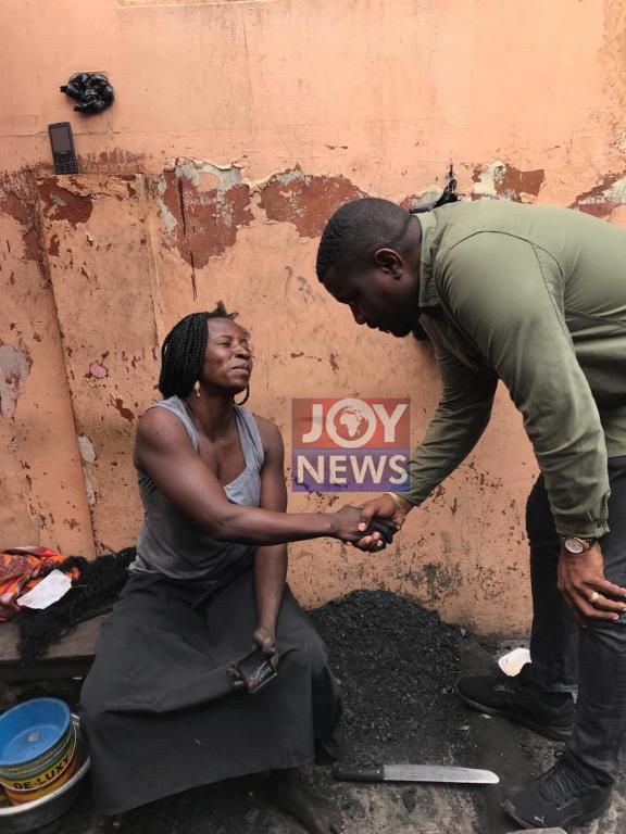 John Dumelo in Tesano market