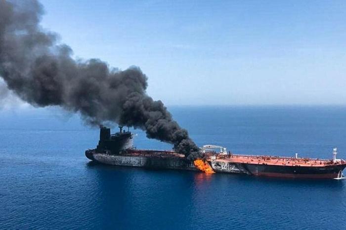 A picture obtained by AFP from Iranian News Agency ISNA on June 13, 2019 reportedly shows fire and smoke billowing from the Norwegian-owned Front Altair tanker, one of two vessels hit by suspected attacks in the waters of the Gulf of Oman