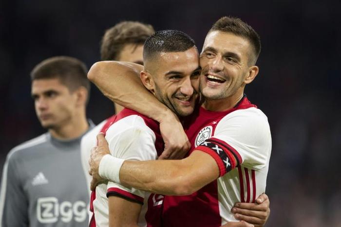 Dusan Tadic (R) fired Ajax into the Champions League playoff with two penalties