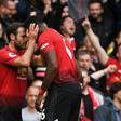 Positive Pogba: Juan Mata (left) believes Paul Pogba (right) remains a positive influence for Manchester United