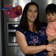 Cindy Luna holds her son Mateo, born via in-vitro fertilization in 2017, at the family's Virginia home