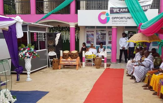 Ceremony to open new branch of Opportunity International Savings and Loans