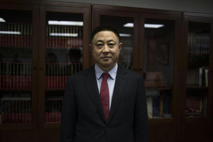 Hu Keqin had planned to open 1,500 bakeries in China, supplied with French flour
