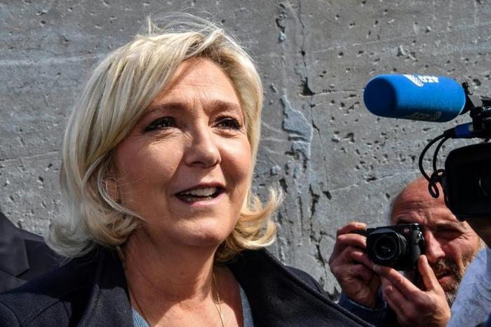 French far-right leader Marine Le Pen shared the gruesome images in December 2015, a few weeks after IS jihadists killed 130 people in Paris
