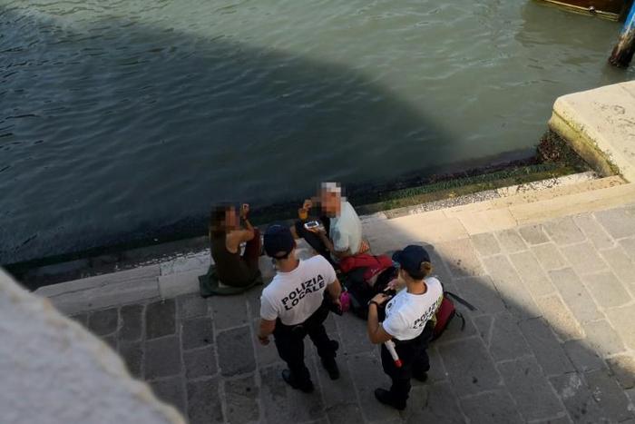 Under a new law passed in Venice in May, people can be fined and asked to leave the city for inappropriate behaviour