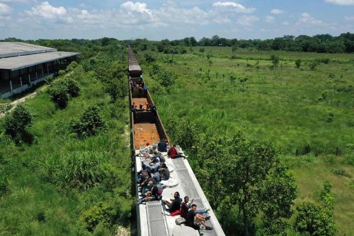 Aerial view of migrants on a train known as "The Beast," which takes them to the tourist town of Palenque