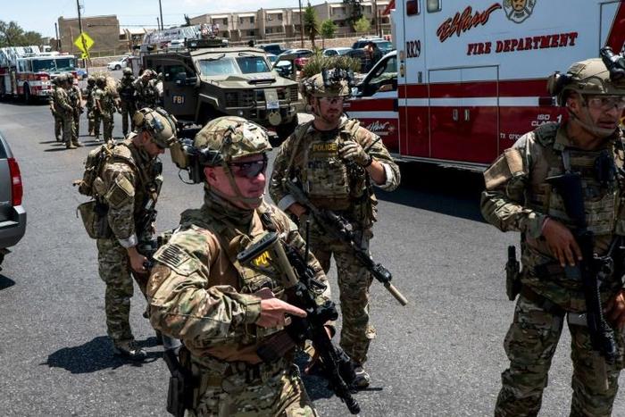 Law enforcement agents respond to an active shooter situation at a Walmart near Cielo Vista Mall in El Paso, Texas on Saturday, Aug. 3, 2019