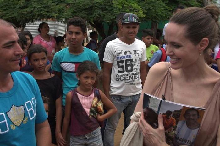 American actress Angelina Jolie, the UN special envoy for refugees, is seen meeting with Venezuelan refugees in the Colombian town of Riohacha in June 2019