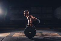 weightlifting strong man on a gym