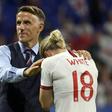 Coach Phil Neville comforts striker Ellen White after England's 2-1 defeat to the USA in the women's World Cup semi-final