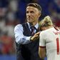 Coach Phil Neville comforts striker Ellen White after England's 2-1 defeat to the USA in the women's World Cup semi-final