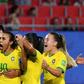 Brazil's forward Marta (2ndL) and teammates celebrate after she scores from the penalty spot agaist Italy