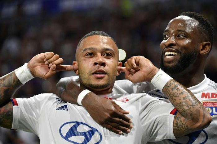 Forwards Memphis Depay and Moussa Dembele both struck twice as Lyon hammered Angers