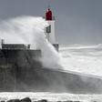 Storm Miguel whipped up huge seas along France's western coast, where three rescuers died when their boat capsized as they tried to help a fishing boat in distress
