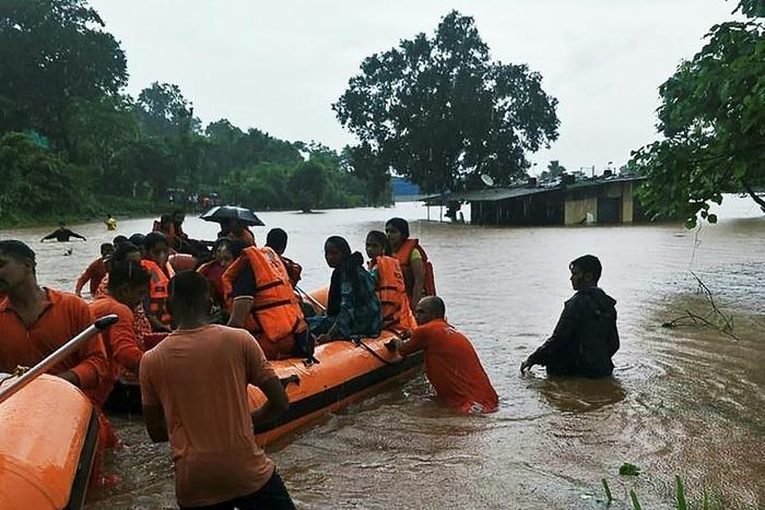 The train was stuck for several hours in Thane district before authorities called in the Indian navy and National Disaster Response Force