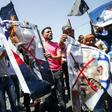 Palestinians demonstrate in the Gaza Strip against the US-sponsored Middle East economic conference